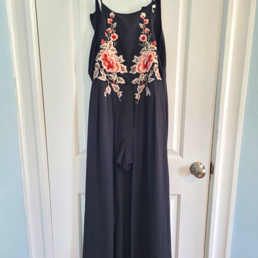 Black romper with floral embroidery